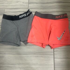 2 pairs of nike pros